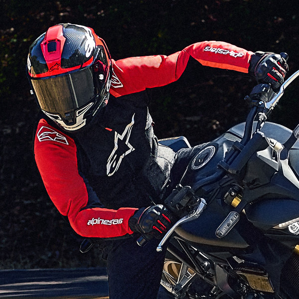 alpinestars_jacket_textile_t-sps-v2-waterproof_black-red-fluo-red_lifestyle2.jpg
